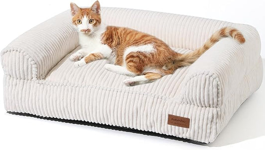FUKUMARU Dog Couch Bed, Corduroy Cozy Cat Bed for Indoor Cats with Washable Cover, Supportive Waterproof Dog Beds Sofa for Small Dogs and Large Cats Cute, 28inch, Medium, Cream